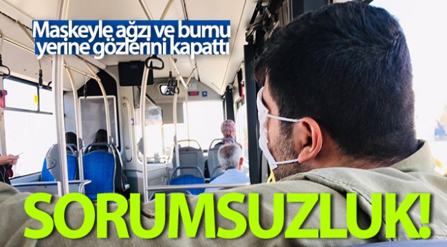 Otobüste yolculuk yaptı, maskeyle ağzı ve burnu yerine gözlerini kapattı