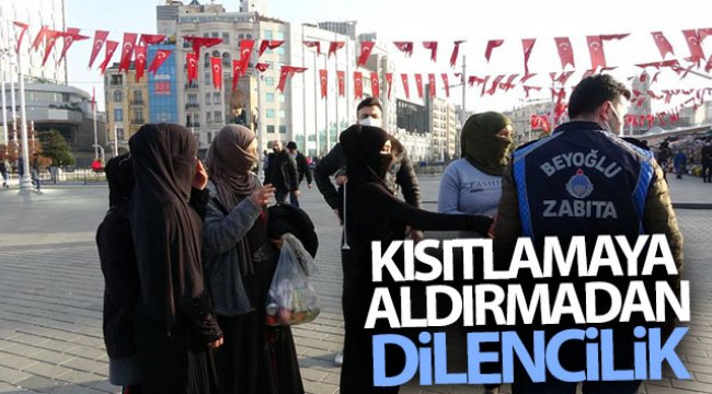 Taksim Meydanı'nda sokağa çıkma kısıtlamasına aldırmadan dilencilik